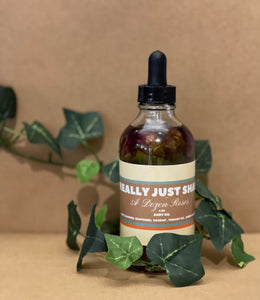 a dozen roses body oil